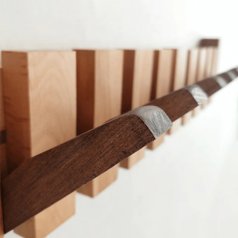 Pianello – Contoured Wood Wall Hanger with Fold-Down Hooks