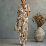 Solene – Printed V-Neck Wide-Leg Jumpsuit with Cinched Waist and Pockets