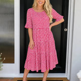 Soleluna – Tiered Polka Dot Midi Dress with Ruffle Sleeves