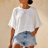 Wearlyn – Oversized Split-Hem T-Shirt with Flared Sleeves