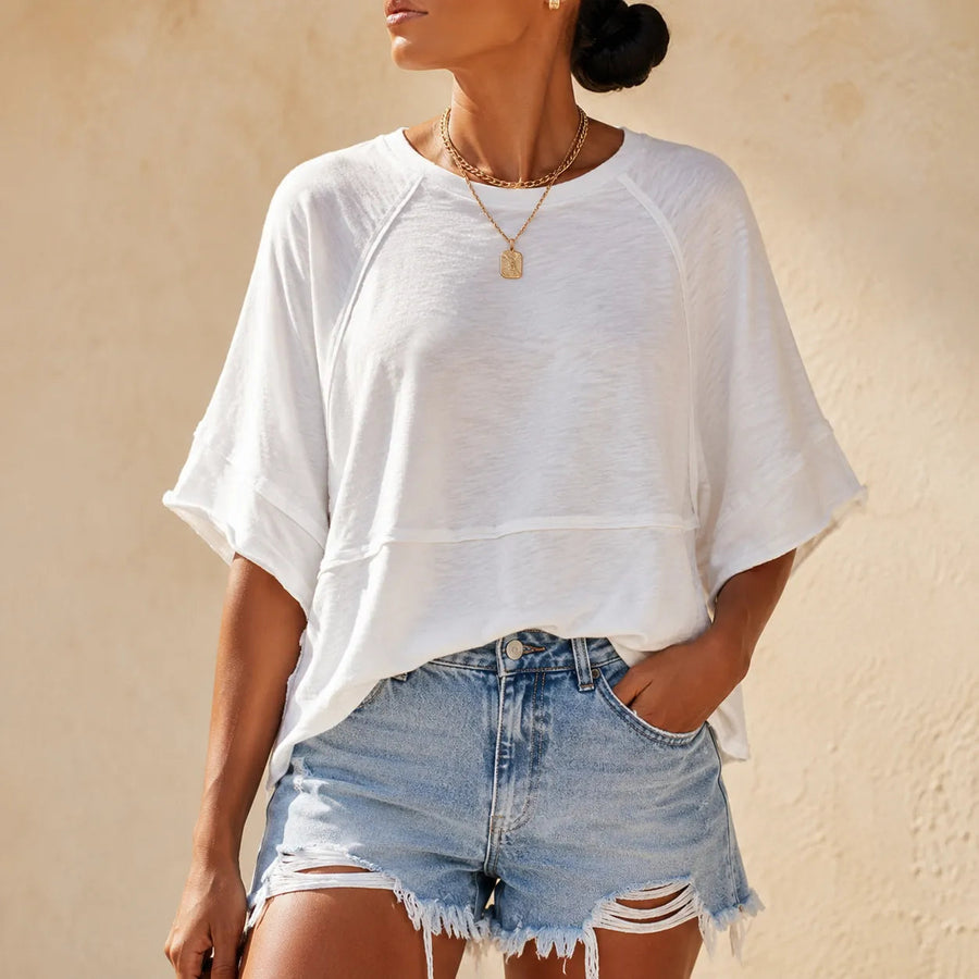 Wearlyn – Oversized Split-Hem T-Shirt with Flared Sleeves