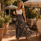 Floressa – Smocked High-Waist Floral Maxi Skirt with Flowy A-Line Sweep