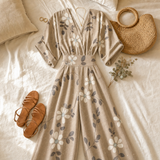 Solene – Printed V-Neck Wide-Leg Jumpsuit with Cinched Waist and Pockets