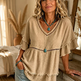Meloria – Bohemian Babydoll Top with Eyelet Cutouts and Fringe Hem
