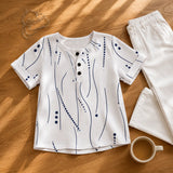 Marellia – Abstract Print Waffle Top with Button Placket