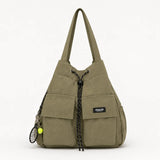 Carryall – Convertible Drawstring Canvas Tote Backpack with Cargo Pockets