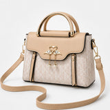 Velora – Swan-Clasp Structured Crossbody Bag with Gold Hardware