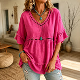 Meloria – Bohemian Babydoll Top with Eyelet Cutouts and Fringe Hem