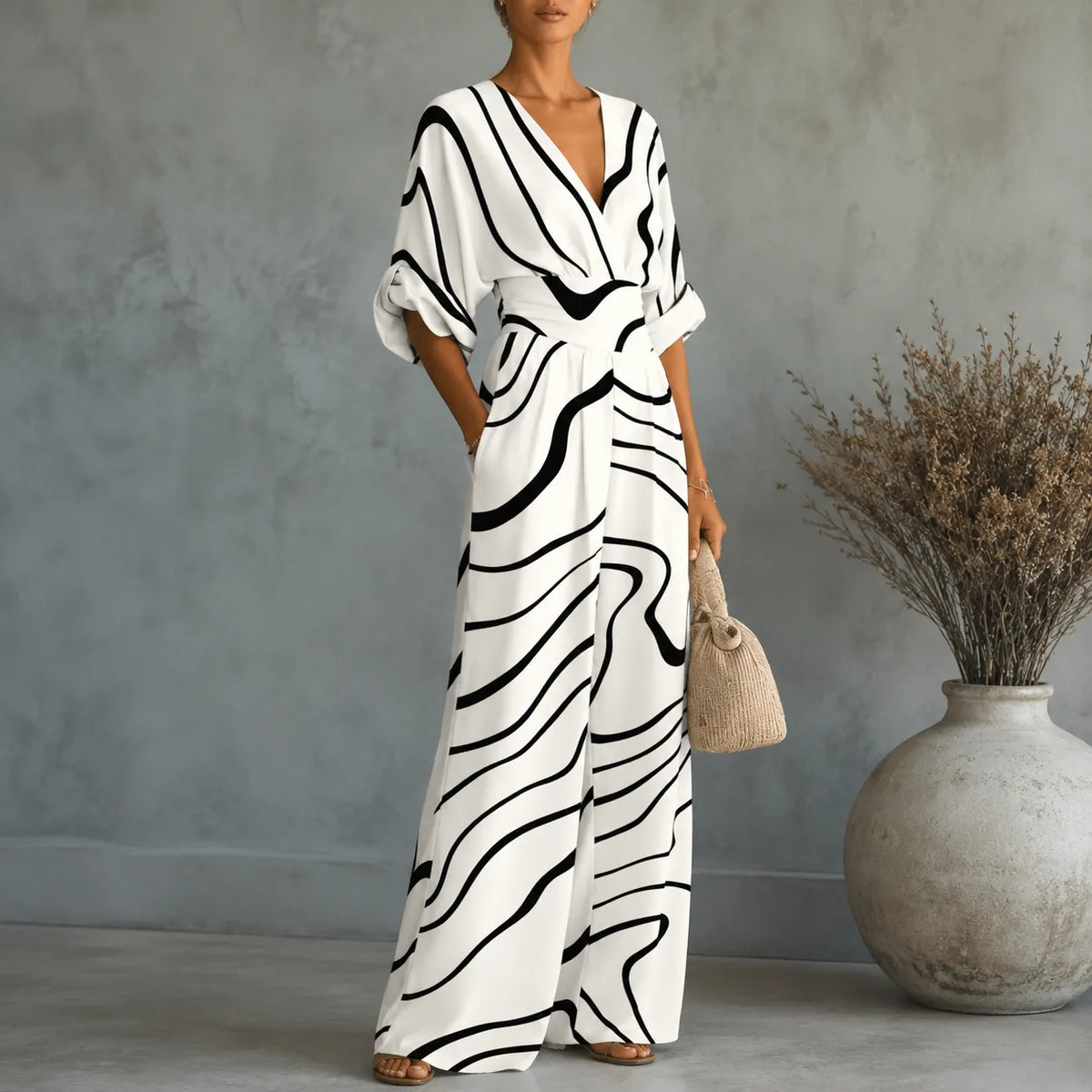 Solene – Printed V-Neck Wide-Leg Jumpsuit with Cinched Waist and Pockets