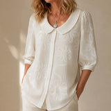 Fiora – Textured Floral Blouse with Puff Sleeves