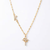 Aurela – Sparkling Initial Cross Necklace
