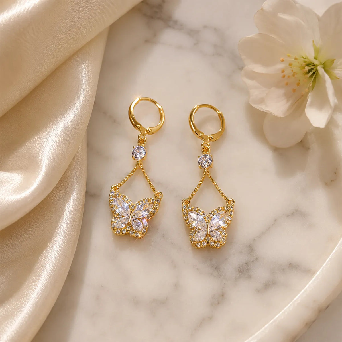 Papillore – Sparkling butterfly drop earrings, gold-tone cubic zirconia, delicate everyday elegance
