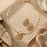 Aurenza – Gold necklace and earring set, textured medallion, flat snake chain