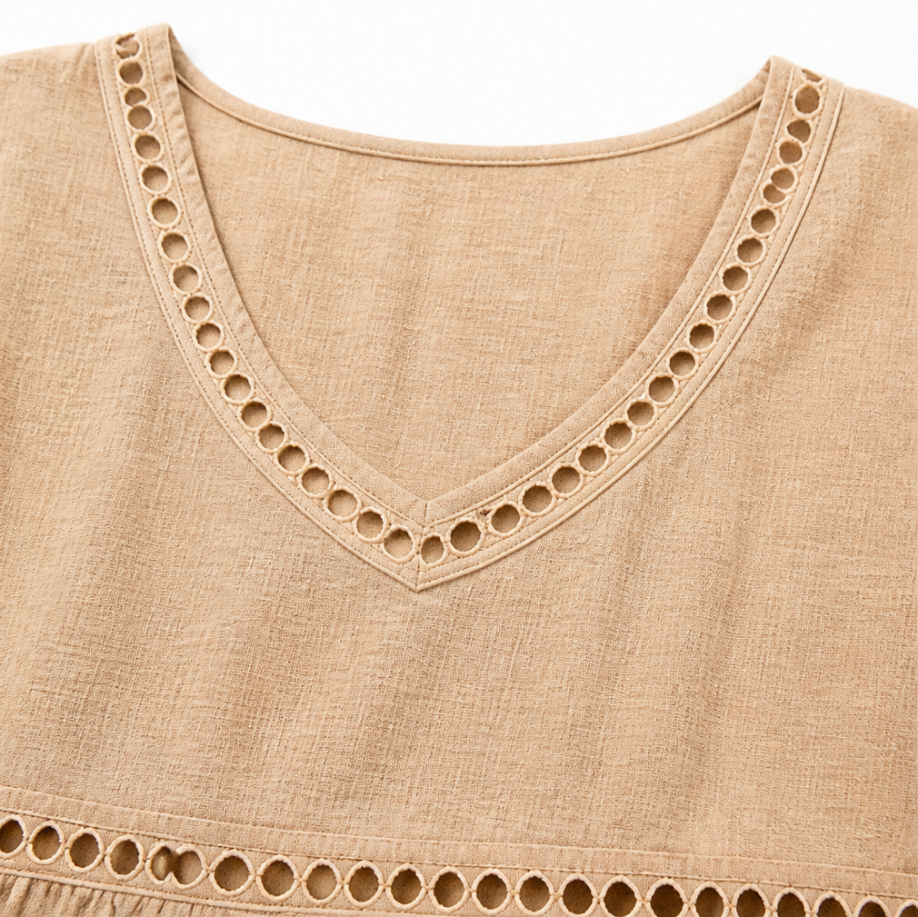 Meloria – Bohemian Babydoll Top with Eyelet Cutouts and Fringe Hem