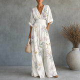 Solene – Printed V-Neck Wide-Leg Jumpsuit with Cinched Waist and Pockets