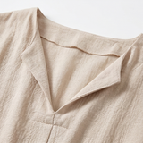 Soléma – Flowy V-Neck Midi Dress with Wooden Buttons