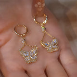 Papillore – Sparkling butterfly drop earrings, gold-tone cubic zirconia, delicate everyday elegance