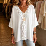 Restedge – The Ruffle Blouse That Skims, Never Clings