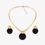 Aurenza – Gold necklace and earring set, textured medallion, flat snake chain
