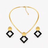 Aurenza – Gold necklace and earring set, textured medallion, flat snake chain